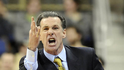 Pitt head coach Jamie Dixon complains to a referee in the first half.