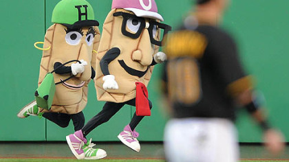 A pierogi race takes place in front of Pirates right fielder Ryan Church during Friday's game at PNC Park.