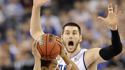 Butler's Ronald Nored tries to get around Duke's Brian Zoubek in the first half.