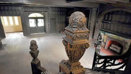 The intricate woodwork and carving done by Wollaeger Manufacturing Co. of Milwaukee are evident in the grand staircase.