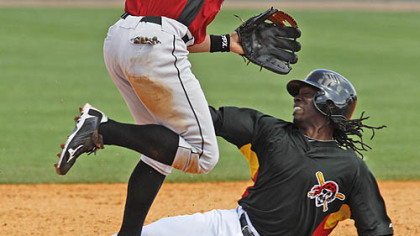 Pirates outfielder Andrew McCutchen is forced out at second base as Astros shortstop Geoff Blum turns a double play in the fifth inning.