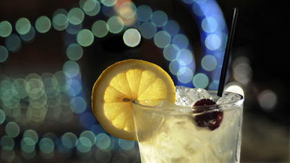 French 75  -  wine based cocktail at Nine on Nine.   The drink is made with gin, fresh lemon juice, simple syrup, a champagne float --  and sometimes a cherry.
