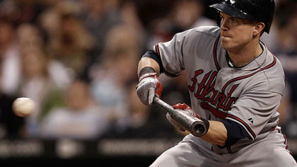 The Braves demoted former Pirates outfielder Nate McLouth to Class AAA Gwinnett.