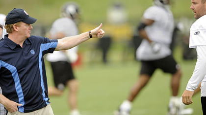NFL commissioner Roger Goodell gives a thumbs up to Steelers quarterback Ben Roethlisberger as he crosses practice fields during morning practice Thursday at St. Vincent College in Latrobe.