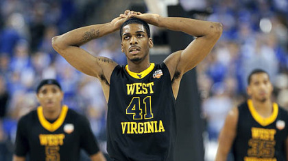 West Virginia's John Flowers reacts during the second half of Saturday nights NCAA Final Four semifinal game against Duke in Indianapolis.