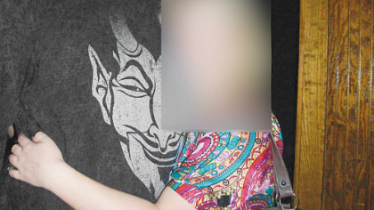 Ben Roethlisberger is shown posing for a photograph with the young woman who later made the sex-assault allegations. The Georgia Bureau of Investigation provided the photo with her face obscured; the Pittsburgh Post-Gazette has digitally obscured it even further to protect her identity.