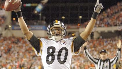 Cedric Wilson celebrates after scoring in the third quarter on a trick play in a 2005 Wild Card win over  the Bengals.