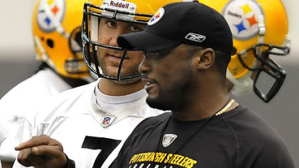 Steelers quarterback Ben Roethlisberger listens to head coach Mike Tomlin during Wednesday's practice at the team's facility on the South Side.