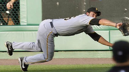 Pirates right fielder Garrett Jones makes a diving catch to rob the Nationals' Adam Dunn in the first inning Thursday at Nationals Park.
