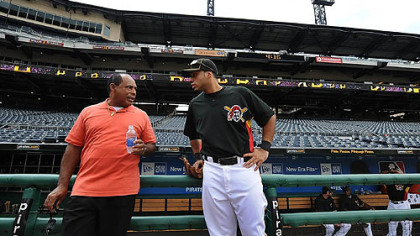 Pirates Pedro Alvarez chats with his dad, Pedro Sr,. during batting practice prior.