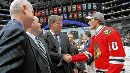 Stephen Johns of Wampum, Pa., is welcomed to the Stanley Cup champion Chicago Blackhawks being selected in the second round of the NHL draft Saturday in Los Angeles.