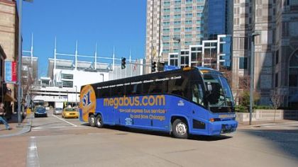 The Megabus leaves Downtown on its maiden Pittsburgh voyage in 2007.