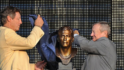 Steelers defensive coordinator Dick LeBeau, with brother, Bob, unveil his bust during his induction into the Pro Football Hall of Fame in Canton, Ohi