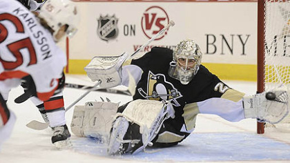 Senators defenseman Erik Karlsson scores past Penguins goaltender Marc-Andre Fleury in the second period of Wednesday's game at Mellon Arena.