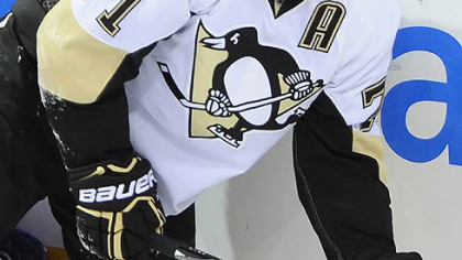Penguins forward Evgeni Malkin grimaces after colliding with Canadiens defenseman PK Subban during Thursday's game at the Bell Centre.