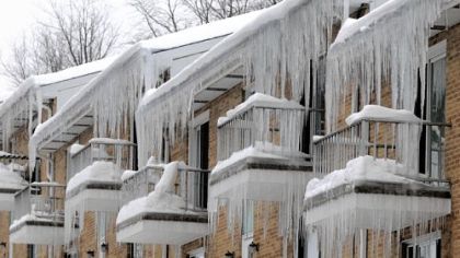 Heavy ice hangs from an apartment building in Crafton.