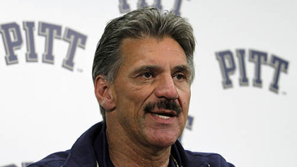 Pitt head football coach Dave Wannstedt answers questions during a news conference Tuesday. Wannstedt signed a two-year extension.