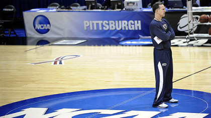 Pitt head coach Jamie Dixon watches as his team practices.