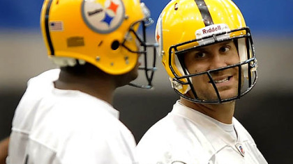 Steelers quarterback Ben Roethlisberger shares a laugh with Byron Leftwich during practice at the team's facility on the South Side Wednesday.