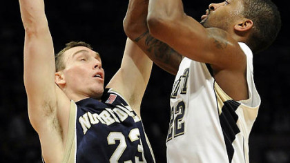 Pitt's Brad Wanamaker draws a foul on Notre Dame's Ben Hansbrough in the first half of the Big East championship quarterfinal game at Madison Square Garden in New York, Thursday.
