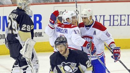 Penguins goaltender Marc-Andre Fleury watches the puck enter the goal during the second period.