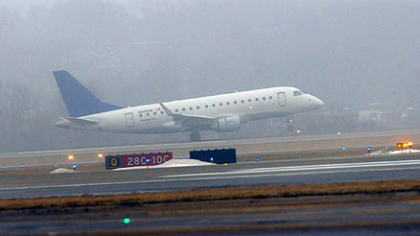 The plane arrives at Pittsburgh International Airport.
