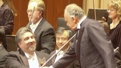 At a December 2000 concert in Heinz Hall, Mr. Cardenes greets conductor Lorin Maazel, who was instrumental in his career.