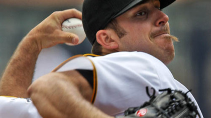 Pirates pitcher Dana Eveland throws in the first inning.