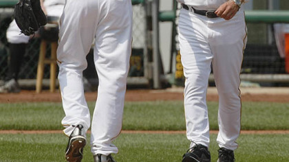 Pirates starter Daniel McCutchen is taken out of the game by manager John Russell in the fourth inning.