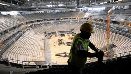 Joe Thompson of Homestead installs seats in the upper level of the new Consol Energy Center. The arena will be home to the Pittsburgh Penguins and host a range of entertainment events such as concerts and family shows.