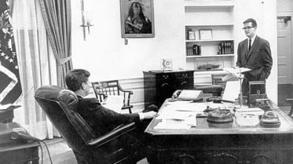 Theodore C. Sorensen, a former Kennedy adviser, chats with President Kennedy in 1962 in the Oval Office. Mr. Sorensen questions the veracity of the planned miniseries on the Kennedys.