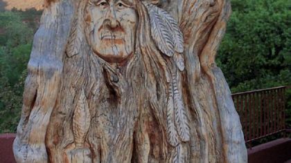 A wooden Indian along the street in downtown Sedona, Arizona.