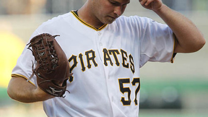 Pirates pitcher Zach Duke stands on the mound during the three-run fourth inning.