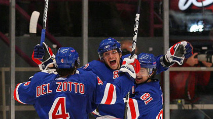 Rangers forward Artem  Anisimov celebrates his second goal of the game with teammates Michael Del Zotto and Enver Lisin in the third period.
