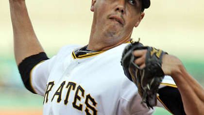 Pirates pitcher Jeff Karstens throws in the first inning.