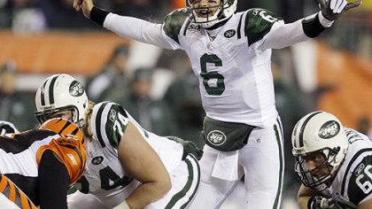 Alan Faneca, lower right, knows all about protecting rookie quarterbacks: first, Ben Roethlisberger; now, Mark Sanchez.