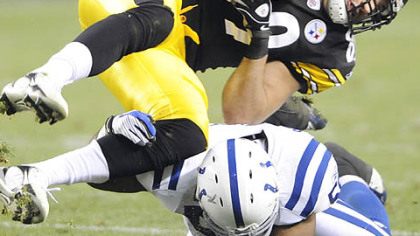 Matt Spaeth takes a hit from the Colts' Gary Bracket in a 2008 game at Heinz Field.