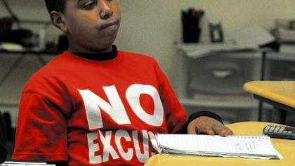 Jonathan Williams sports his "No Excuses" T-shirt in his math/science class at the Propel School in McKeesport.