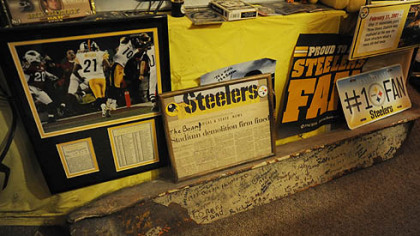 Photos, plaques and a steel beam from Three Rivers Stadium. Dennis wrote notes on the beam while watching games at Three Rivers.