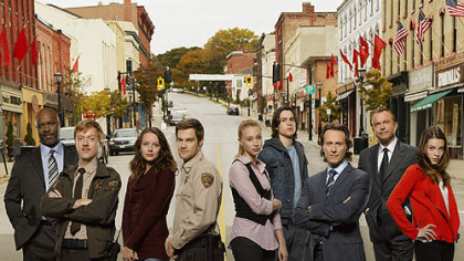ABC's "Happy Town" stars, from left, Geoff Stults, Sam Neill, Lauren German, Steven Weber, Amy Acker, Sarah Gadon, Robert Wisdom, Jay Paulson and Ben Schnetzer.