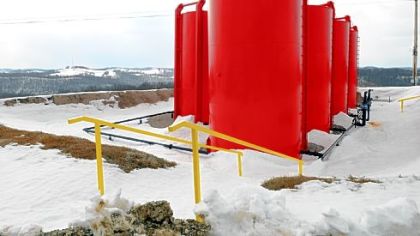 These CNX Gas water tanks hold up to 250 barels of water each after it has been separated from natural methane gas at this Marcellus Shale well in Rogersville, which taps roughly 8,000 feet down into the ground and 2,700 feet laterally to draw from a shale of natural gas. This well recovers roughly 1.4 million cubic feet of natural gas per day.