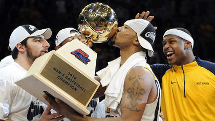 Tournament MVP Da'Sean Butler kisses the Big East trophy.