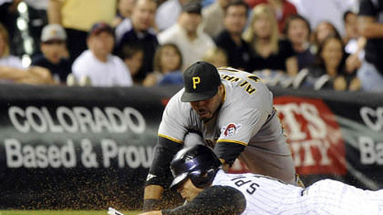 Pirates third baseman Pedro Alvarez tags out the Rockies' Ryan Spilborghs in the eighth inning.
