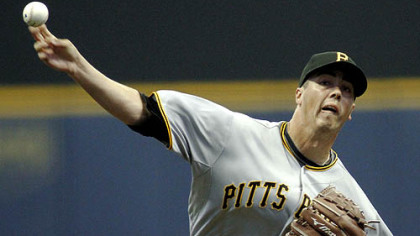 Pirates pitcher Jeff Karstens pitches in the first inning.