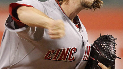 Reds pitcher Mike Leake throws in the first inning.