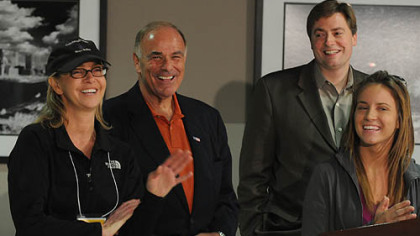 From left, Leslie McCombs, Gov. Ed Rendell, Rep. Jason Altmire and Ali McMutrie talk about the successful conclusion of the trip to Haiti to bring back the orphaned children.