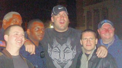 Steelers quarterback Ben Roethlisberger poses for photos with Milledgeville, Ga., police on the same night a 20-year-old college student accused the NFL star of assaulting her in a local nightclub. Pictured are left to right, Officer Paul Cressman; Lt. Willie Goddard; Sgt. Jerry Blash; Mr. Roethlisberger; Detective Everett January; and Nick Reonas, a public safety officer with Georgia College & State University.
