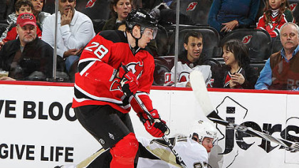 Devils defensman Martin Skoula checks Penguins captain Sidney Crosby in a game earlier this season.
