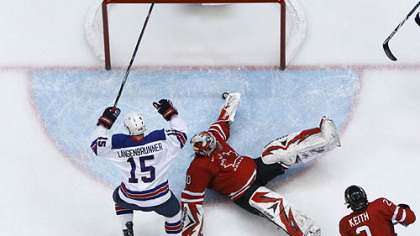 Brian Rafalski, No. 28, scores one of his two goals past Canada's Martin Brodeur.