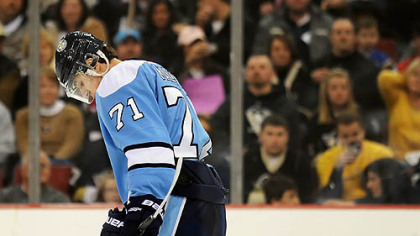 Evgeni Malkin hangs his head after the Nashville Predators tied the score Sunday at Mellon Arena. Nashville won in a shootout, 4-3.